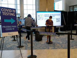 caption: The Tampa International Airport has started coronavirus testing for passengers with a boarding pass or proof of a reservation for a flight in the near future.