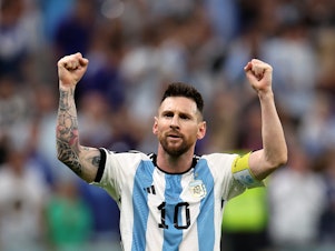 caption: Lionel Messi of Argentina celebrates after scoring the team's second goal during the 2022 World Cup quarterfinal match against the Netherlands on December 09, 2022.