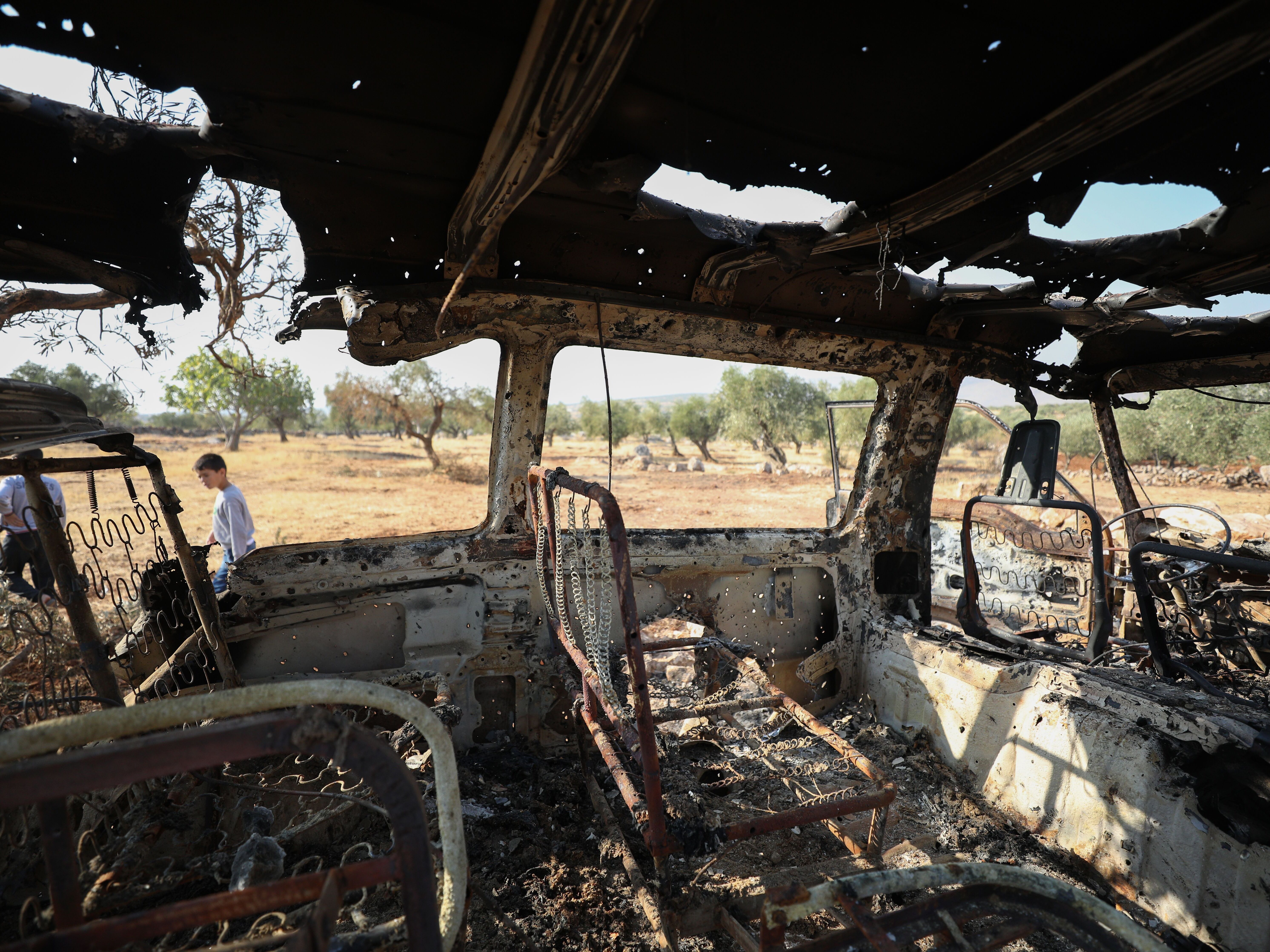 caption: A photo taken on Oct. 27, 2019, shows the inside of the van that Syrian Barakat Ahmad Barakat says he was in when it was targeted by U.S. forces the night of the raid on an ISIS compound, in northwestern Syria.