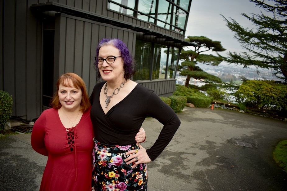 caption: Ex-spouses Lisa Jaffe (left) and Maura Hubbell stand for a portrait in front of Canlis restaurant in Seattle where they had their last date in 2015 following the finalization of their divorce. January 16, 2021. 