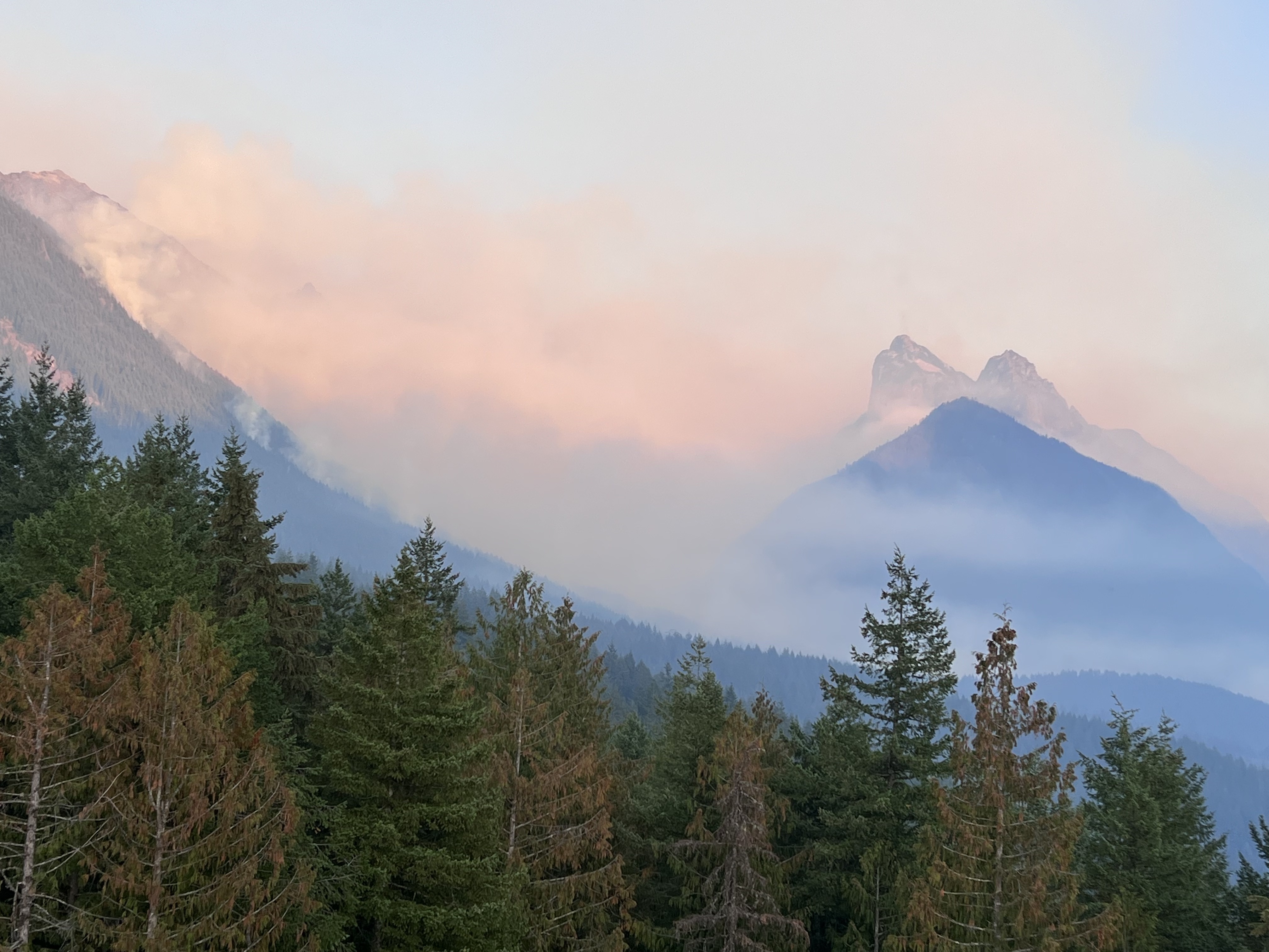 caption:  A view of the Bolt Creek Fire from Heybrook Lookout.