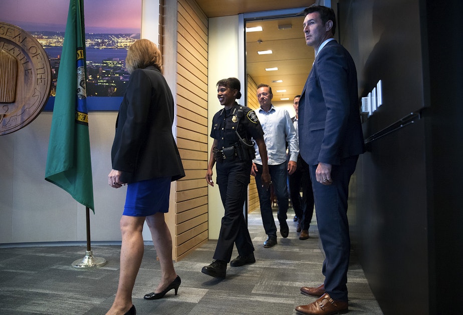 caption: Seattle Mayor Jenny Durkan, left, walks with Carmen Best into a press conference on Tuesday, July 17, 2018, at City Hall in Seattle. 