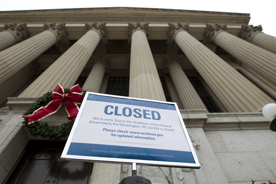 caption: A closed sign is displayed at The National Archives entrance in Washington, Tuesday, Jan. 1, 2019, as a partial government shutdown stretches into its third week. A high-stakes move to reopen the government will be the first big battle between Nancy Pelosi and President Donald Trump as Democrats come into control of the House. (Jose Luis Magana/AP)