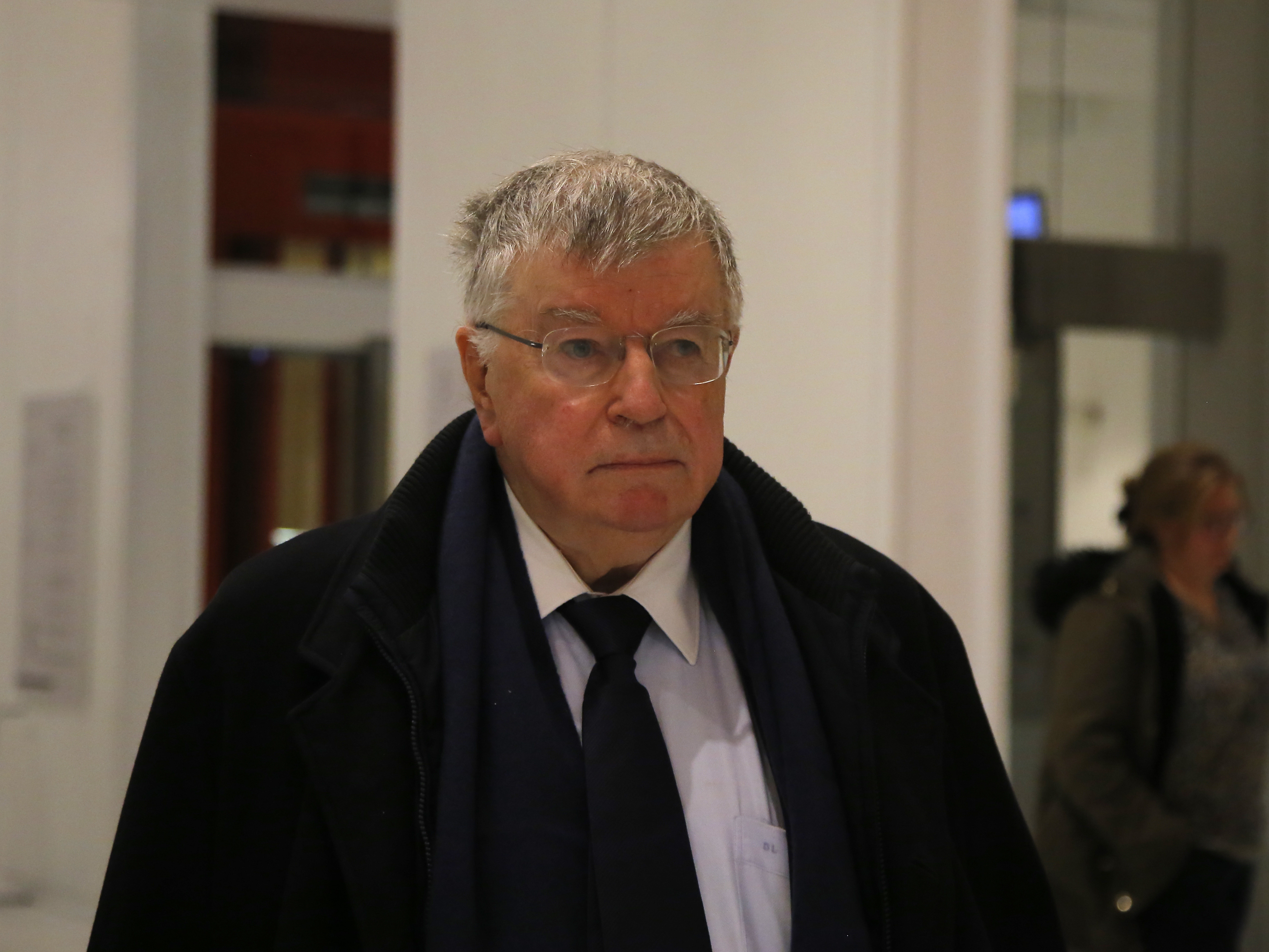 caption: Didier Lombard, former chief executive of the French telecommunications powerhouse now known as Orange, leaves the courtroom Friday after receiving a jail sentence over a string of employee suicides.