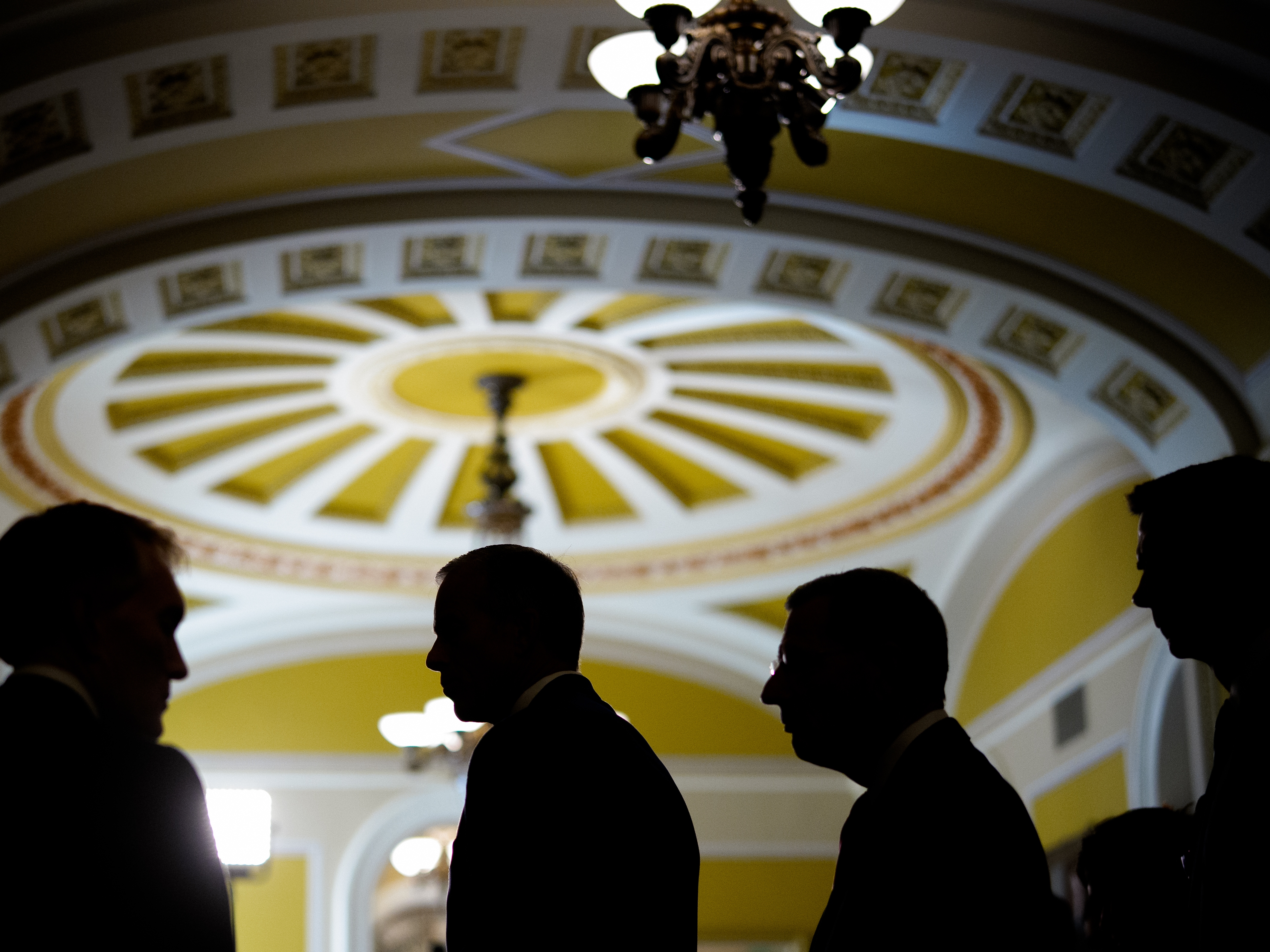 caption: From left, Sen. James Lankford, R-Okla., Senate Majority Leader John Thune, R-S.D., Senate Majority Whip John Barrasso, R-Wyo., and Sen. Tom Cotton, R-Ark., step away from reporters following a Republican policy lunch at U.S. Capitol on Oct. 15, 2025. <br>