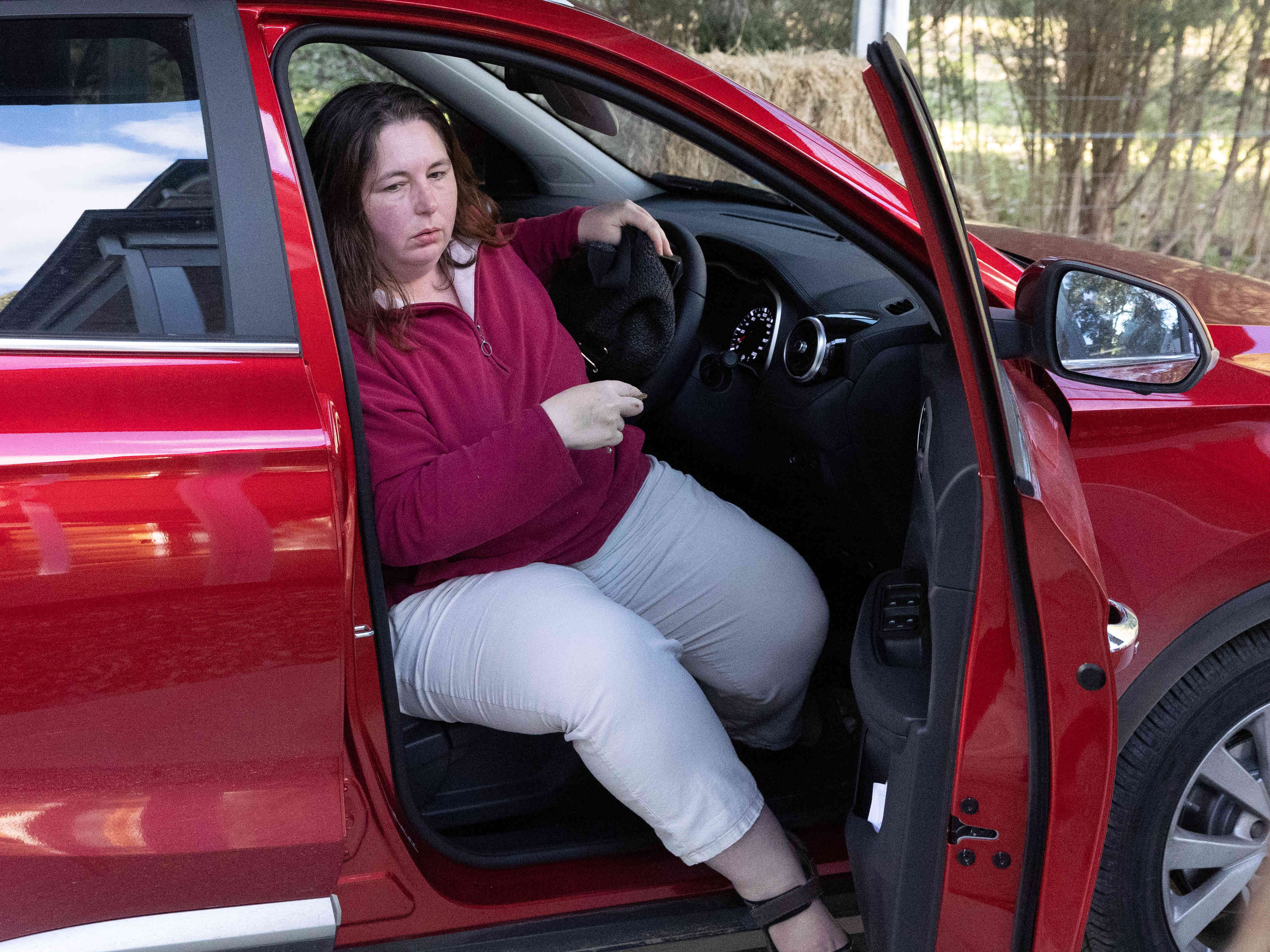 caption: Erin Patterson was arrested and charged with multiple murders on Thursday. She is seen here arriving at her home in Leongatha, Victoria, in August.