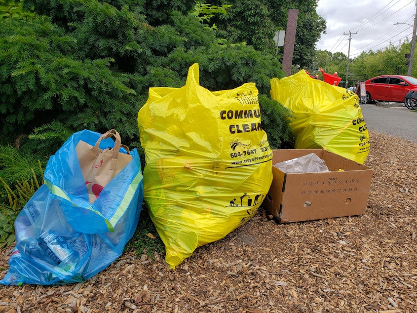 caption: Litter collected by volunteers often contains recyclables like aluminum cans and plastic bottles.