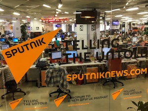 caption: The main newsroom of Russian outlet Sputnik News in Moscow on April 27, 2018.