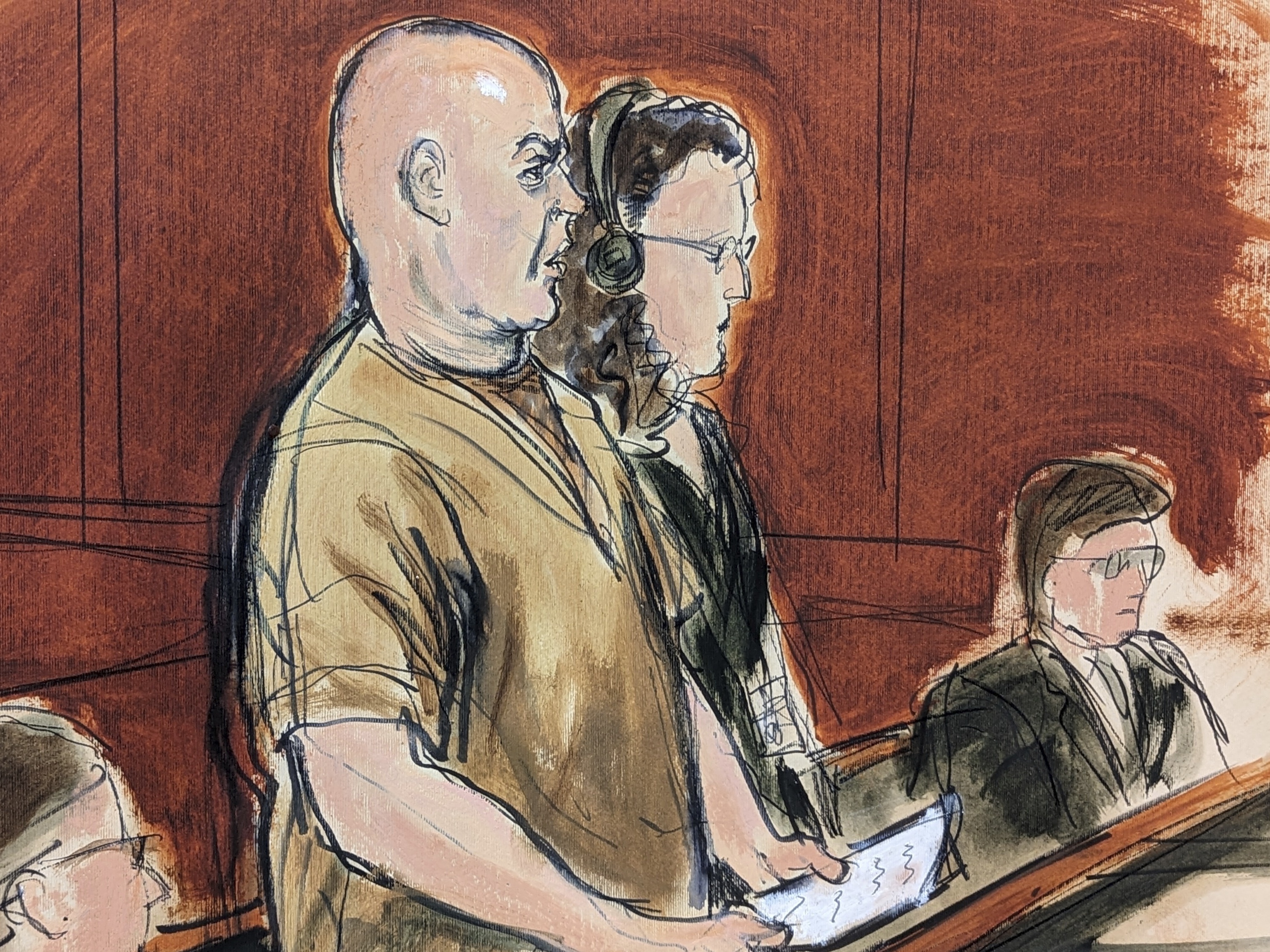 caption: In this courtroom sketch, defendant Lawrence Ray (left) makes a statement during his sentencing in Manhattan federal court on Friday in New York, as his defense attorney, Peggy Cross-Goldenberg looks on.