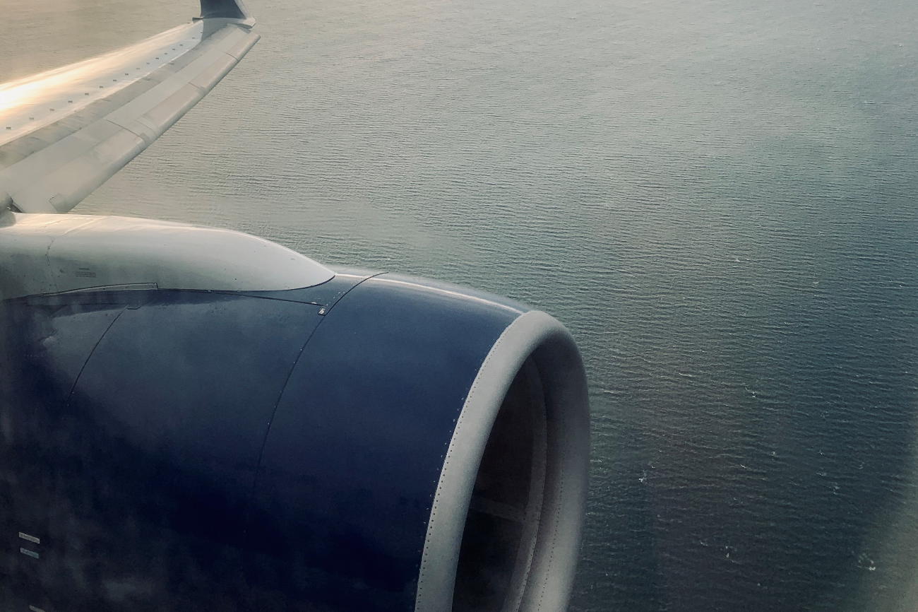 caption: "From my seat looking out at the 90 KG of carbon I am releasing per hour by traveling by air yesterday morning on my way to New York. Traveling for work isn’t always optional so it will be a challenge to reducing emissions in this way. Something I am looking to do is be more efficient in the way I travel for leisure."