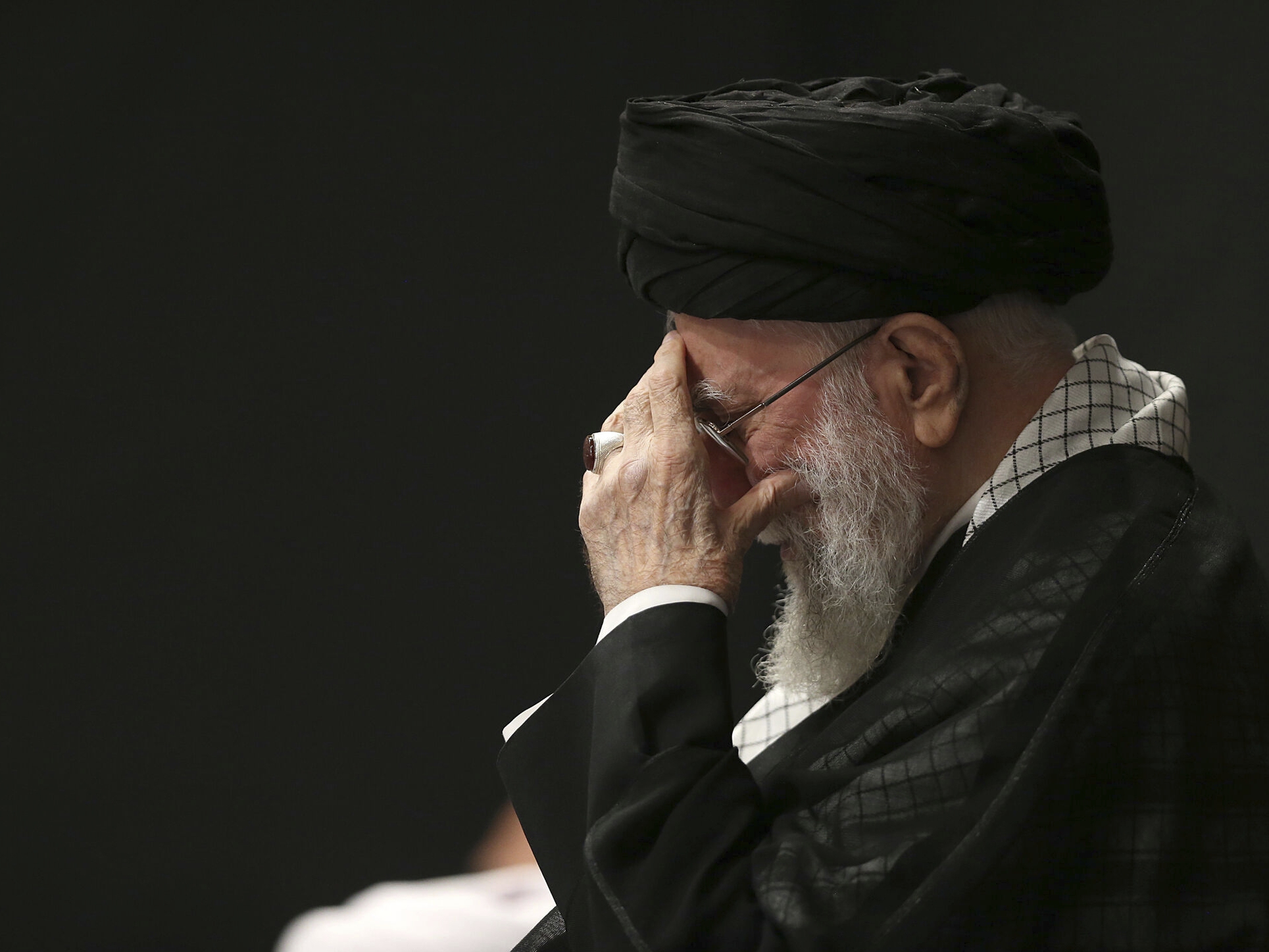 caption: Iranian Supreme Leader Ayatollah Ali Khamenei attends a mourning ceremony commemorating the death anniversary of the Prophet Muhammad's grandson, in Tehran, Iran, on Saturday.