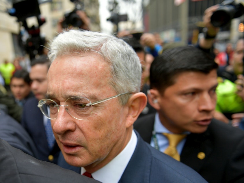 caption: Former Colombian President (2002-2010) and Sen. Álvaro Uribe goes to a hearing before the Supreme Court of Justice in a case over witness tampering in Bogotá, Colombia, on Oct. 8, 2019. The Supreme Court has now ordered Uribe be put under house arrest.