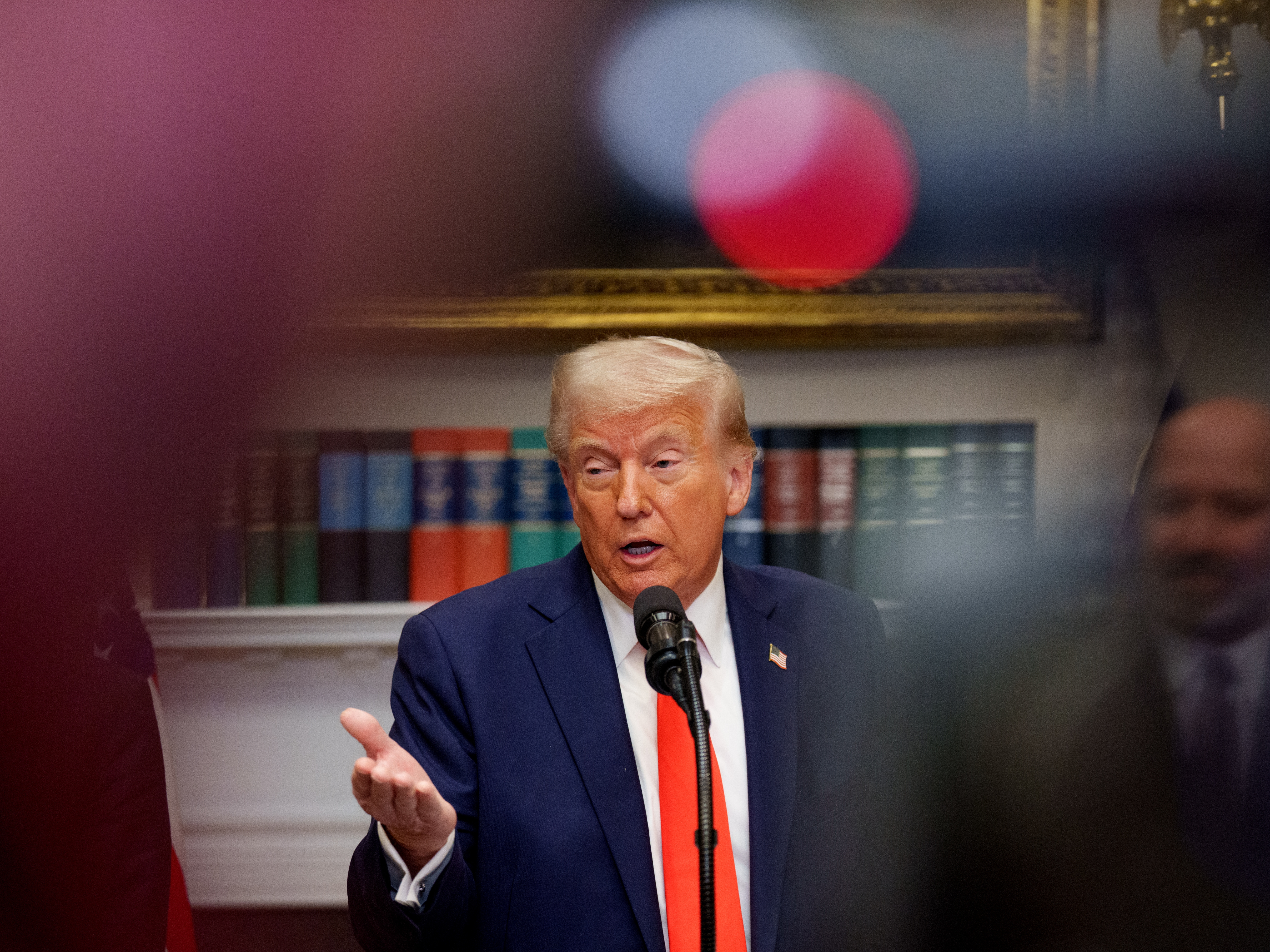 caption: President Trump speaks in the Roosevelt Room of the White House on March 3, 2025 after announcing that Taiwan Semiconductor Manufacturing Company plans to invest $100 billion in new manufacturing facilities in the United States.
