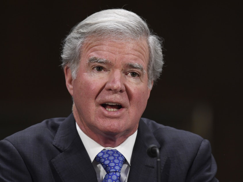 caption: NCAA President Mark Emmert testifies on Capitol Hill in February.