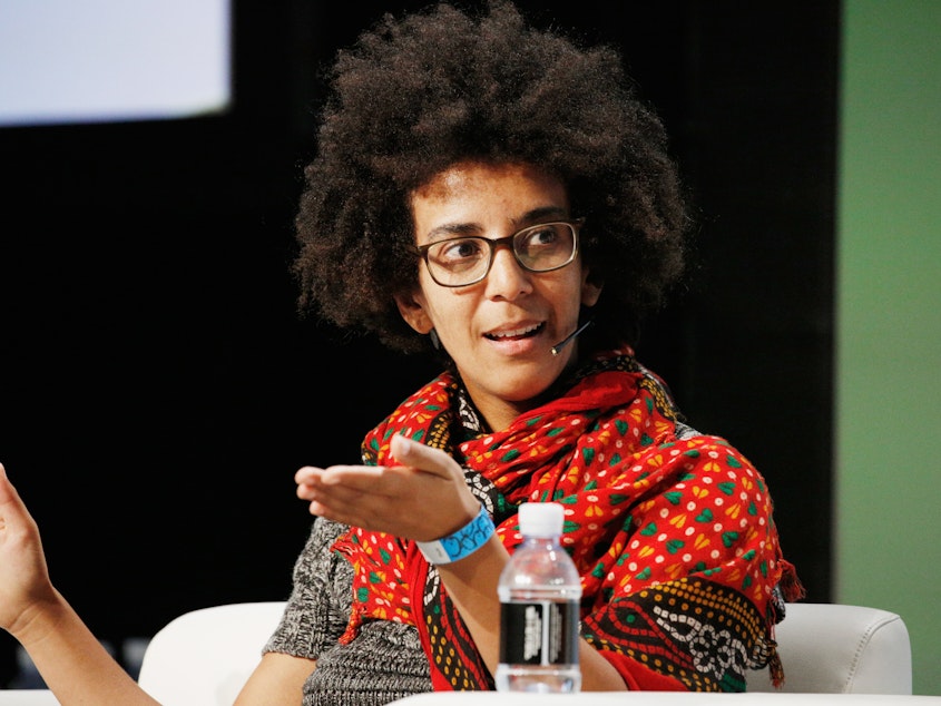 caption: Former Google AI Research Scientist Timnit Gebru speaks here in September 2018. Gebru says she was abruptly fired from the tech giant after a dispute involving a research paper.