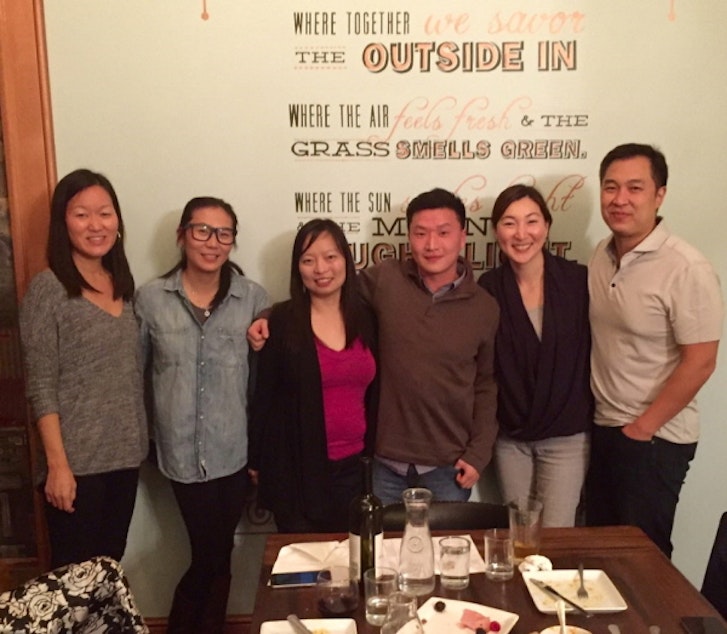 caption: Jenny Kim (second from right) with Adam Crapser (third from right)