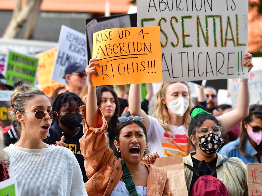 caption: Protesters gather outside the U.S. Courthouse in Los Angeles to defend abortion rights on May 3, 2022, after a Supreme Court opinion overturning Roe v. Wade was leaked.