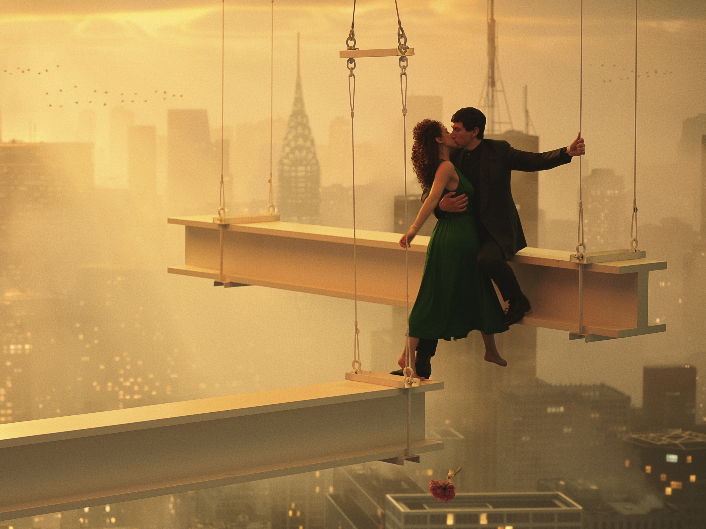 caption: Nathalie Emmanuel and Adam Driver star as Julia and Cesar in <em>Megalopolis</em>.