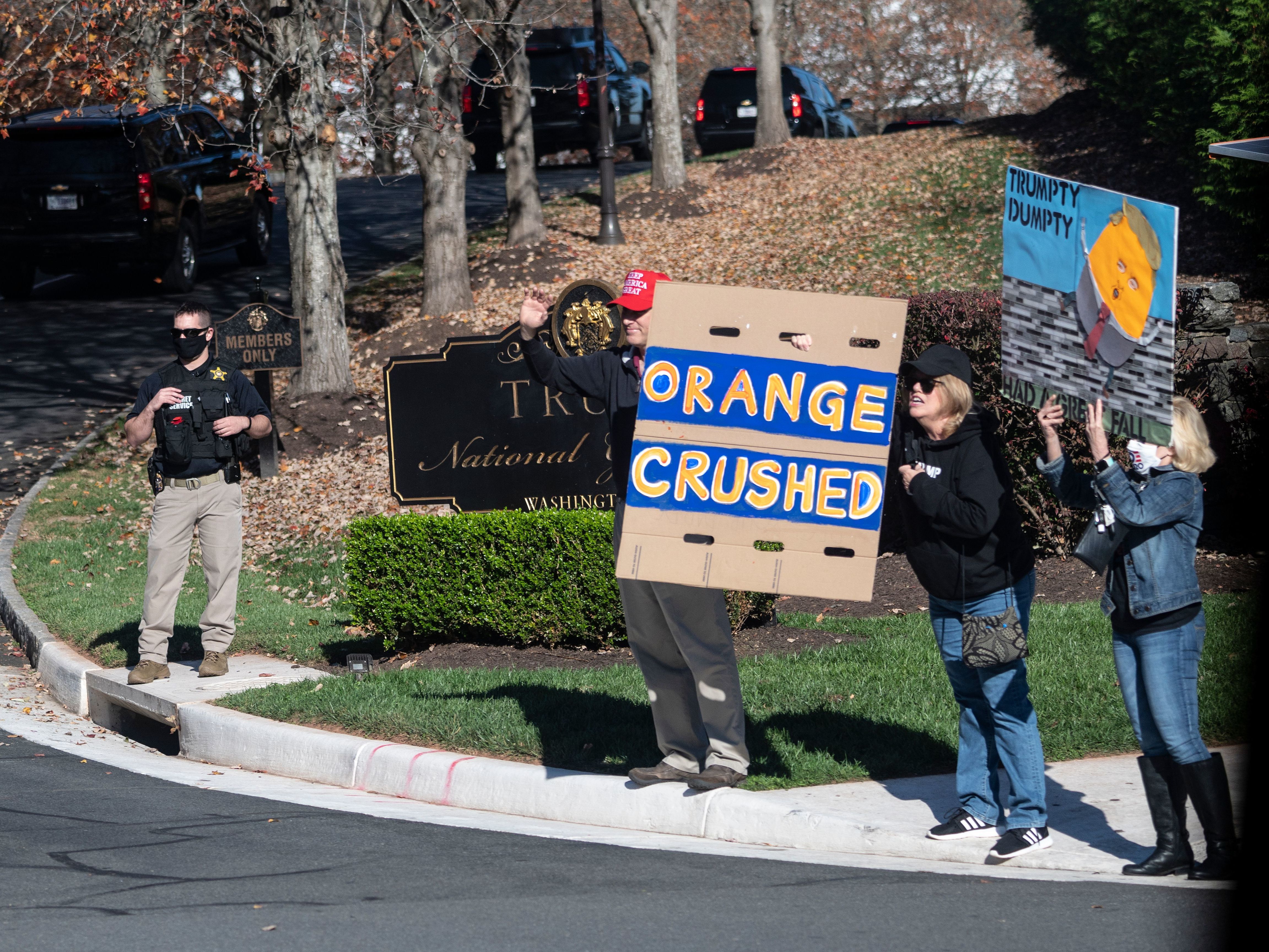caption: Supporters and protesters of President Trump gathered outside the Trump International Golf club as the motorcade passed in Sterling, Virginia on Sunday.