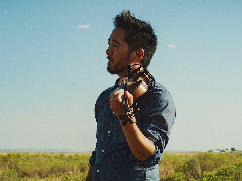 caption: Kishi Bashi's <em>Omoiyari, </em>out May 31, is largely inspired by the artist's visit to ex-internment camps in America.