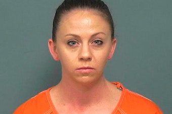 caption: Amber Guyger, the former Dallas police officer who fatally shot an unarmed black man in his own home told a 911 dispatcher, "I thought it was my apartment" several times as she waited for emergency responders to arrive. Guyger is charged in the September, 2018 killing of Botham Jean.
