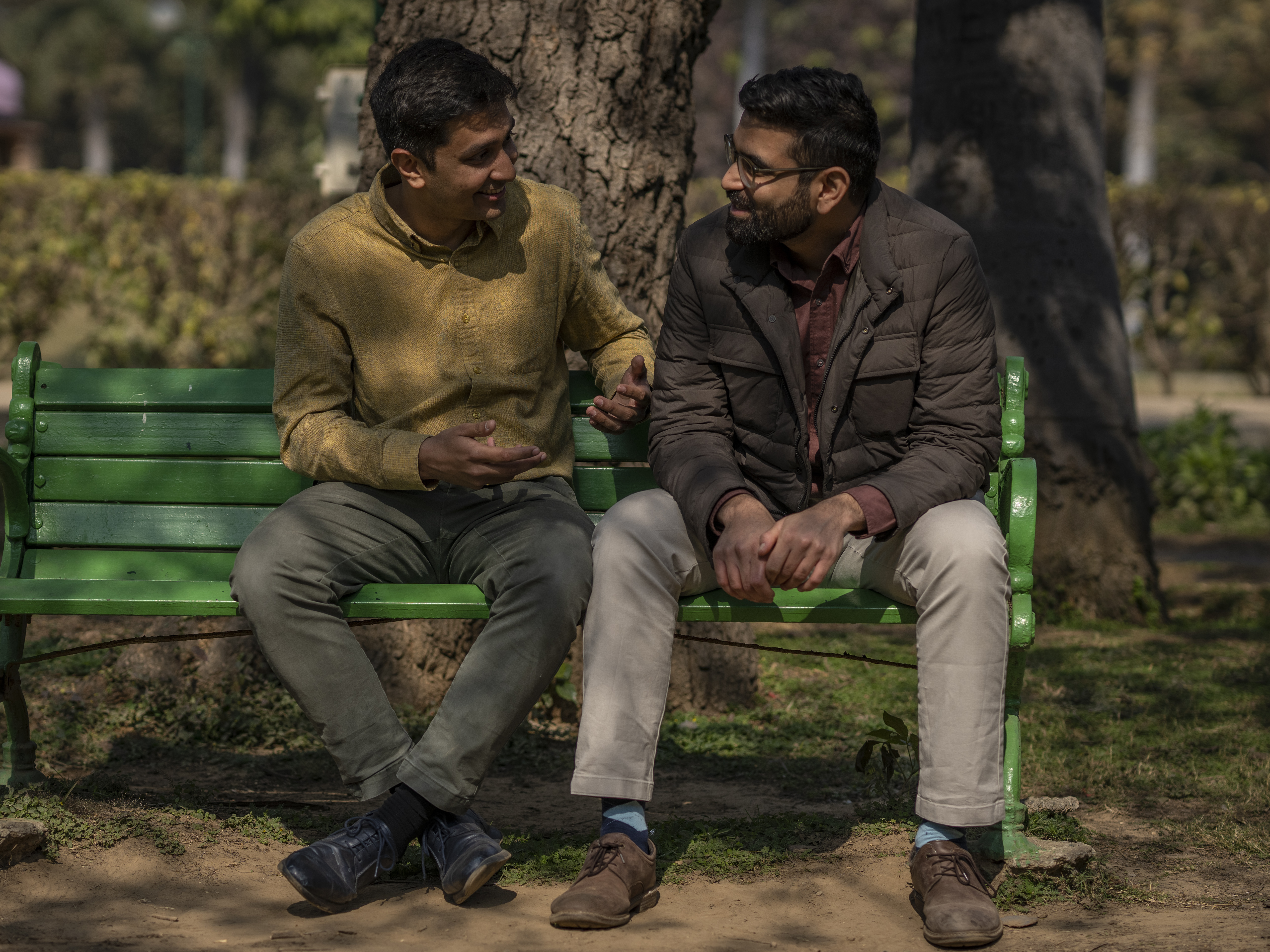 caption: Indian couple Utkarsh Saxena, left, and Ananya Kotia, chat inside a public park in New Delhi, India, Jan. 18, 2023. The couple, now 15 years into their relationship, is joined by three other couples who have filed a petition to India's Supreme Court that seeks the legalization of same-sex marriage.