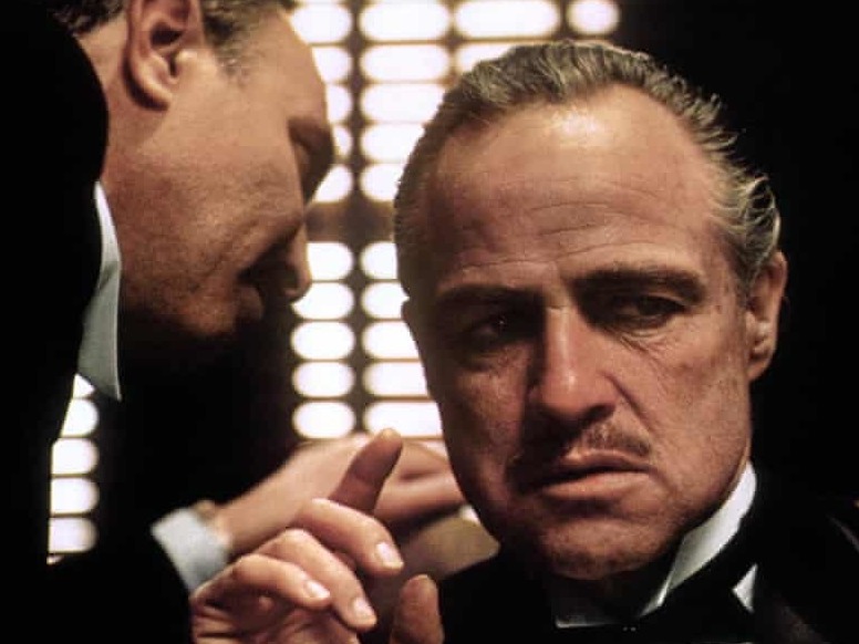 caption: Marlon Brando in the film The Godfather (1972).