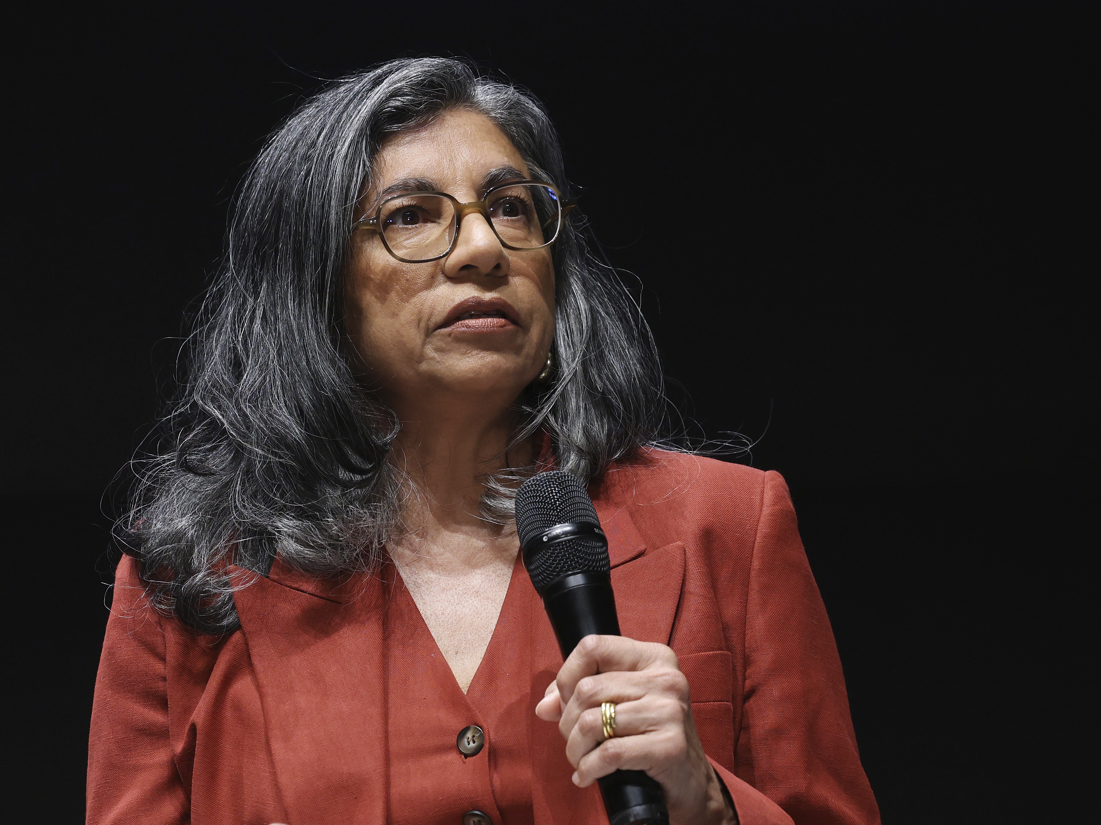 caption: Binaifer Nowrojee speaks on stage at the Global Citizen NOW festival, Saturday, June 29, in Seville, Spain.