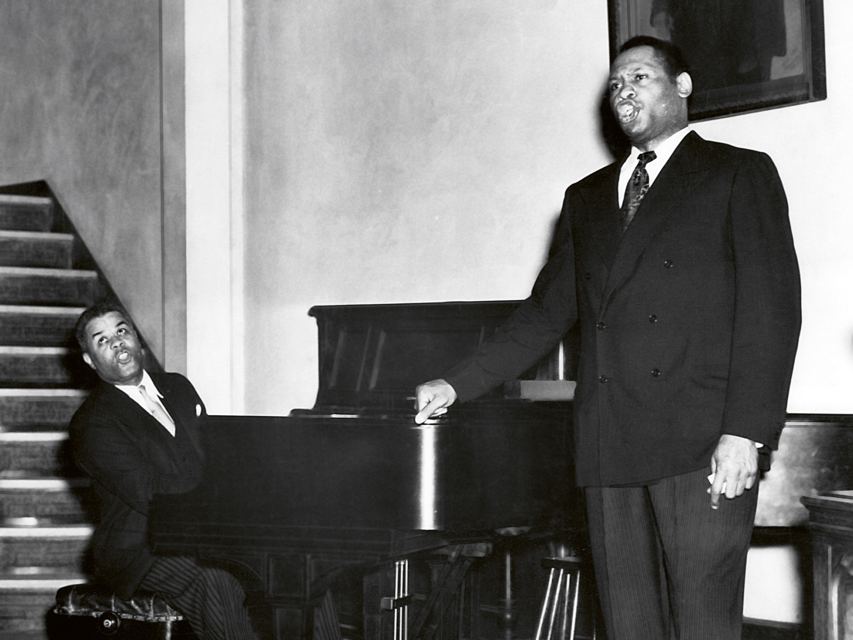 caption:  Lawrence Brown, left, and Paul Robeson, right, performing at Mother A.M.E. Zion Church, Harlem, New York, 1941.