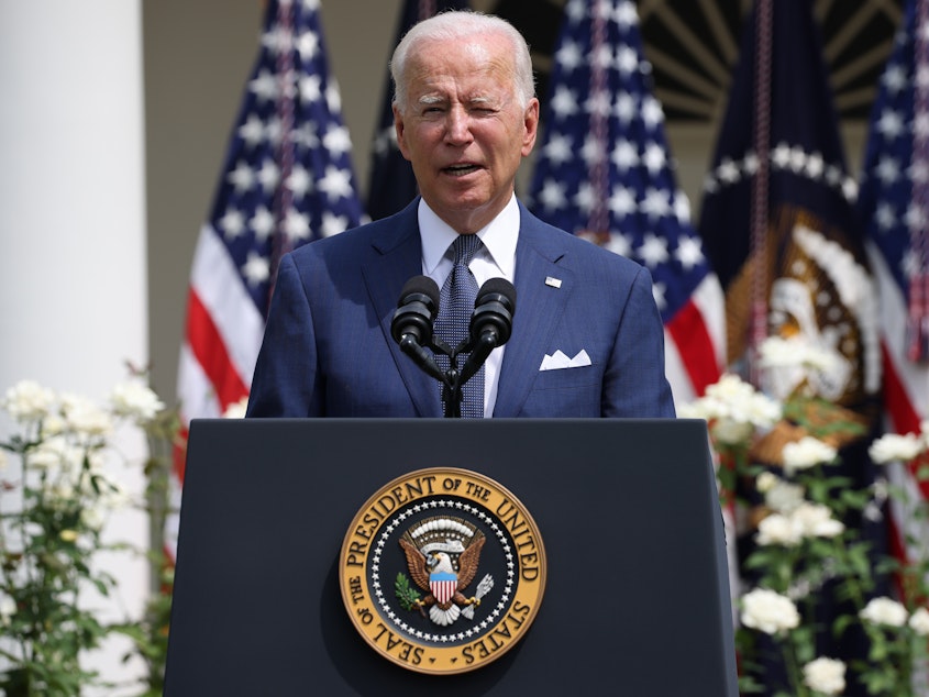 caption: President Biden delivers remarks during an event in the Rose Garden of the White House on Monday.