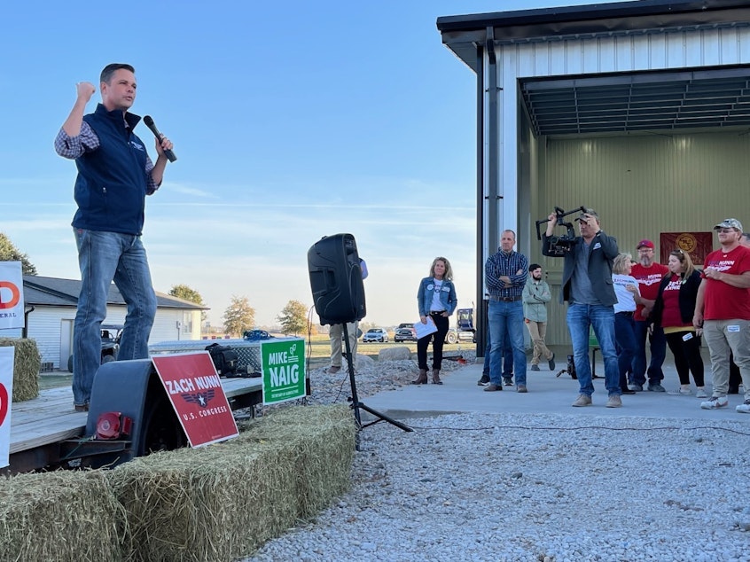 caption: Iowa Republican congressional candidate Zach Nunn speaks at an October campaign event outside Des Moines.