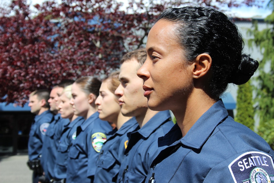 caption: Kimberly Rodriguez, a new recruit for the Seattle Police Department, on her first day at the police academy. That class of 30 recruits included eight women, which was unusual. Most classes have between one and five female recruits.