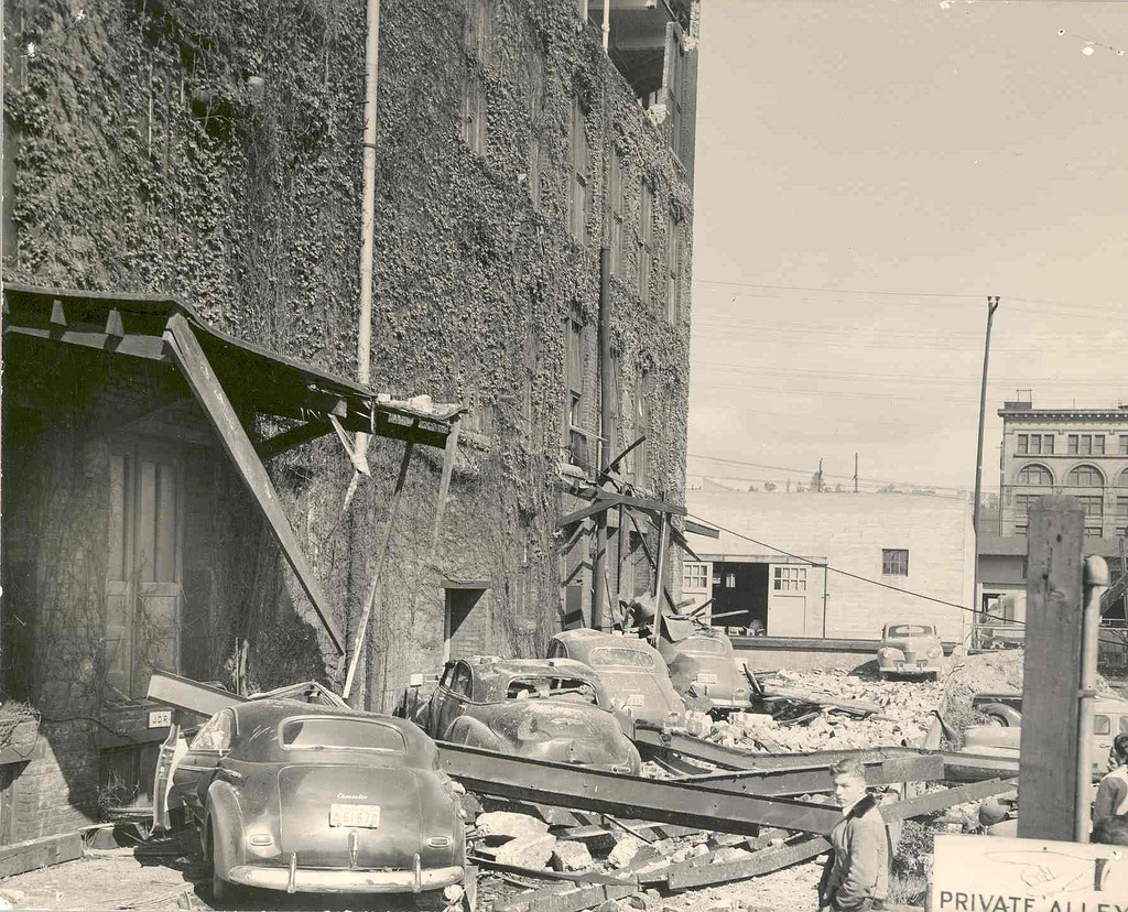 caption: An earthquake in 1949 collapsed ancillary structure to commercial building in Seattle.