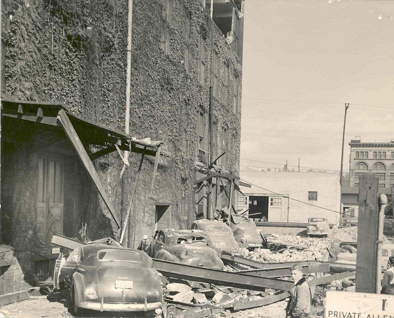 caption: An earthquake in 1949 collapsed ancillary structure to commercial building in Seattle.