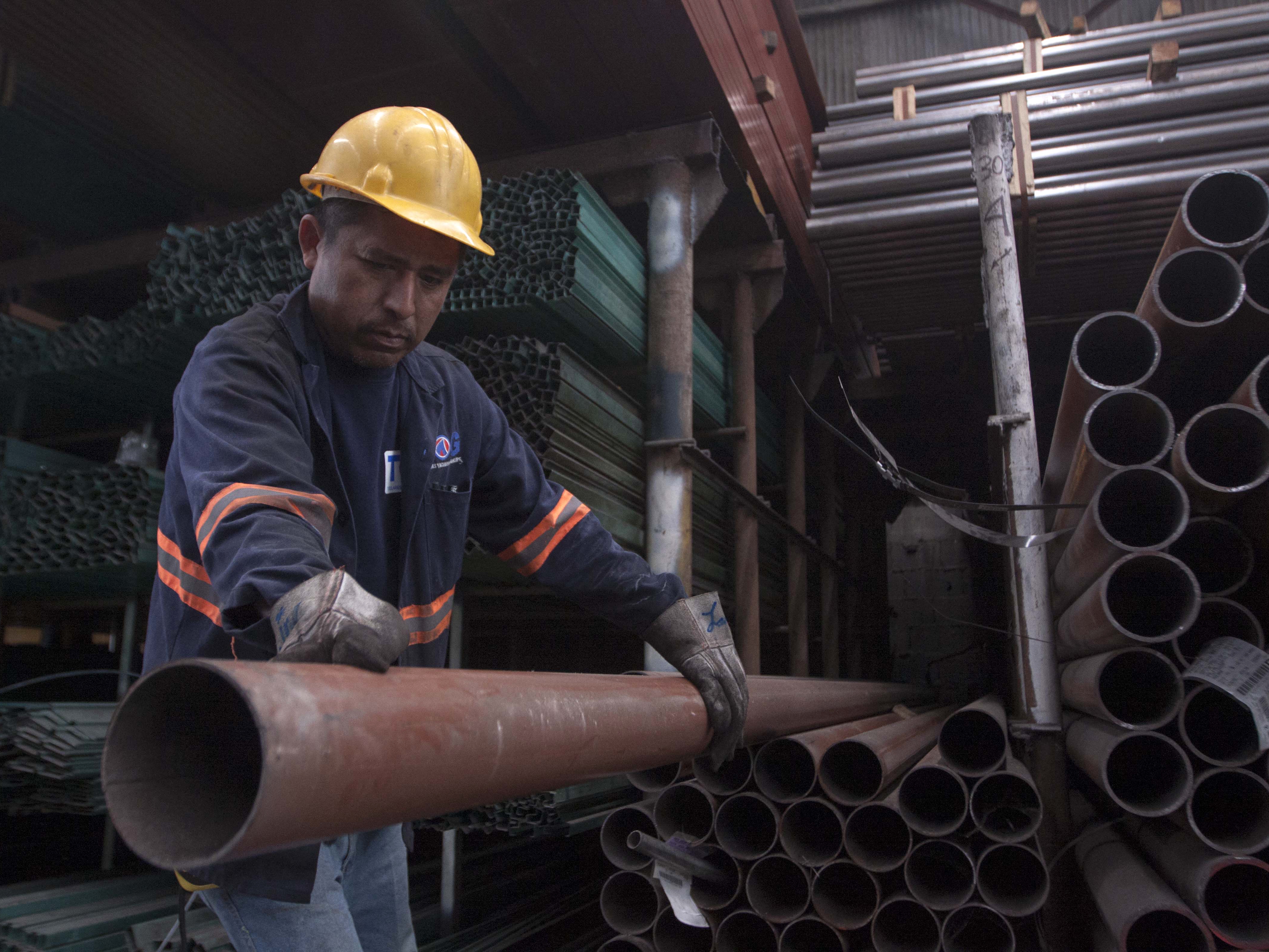 caption: A man works in a steel distribution factory in Monterrey in northern Mexico in May 2018. Mexico announced sweeping retaliatory tariffs on a host of U.S. goods Thursday after the United States slapped steep tariffs on steel and aluminum from Mexico, Canada and the European Union.