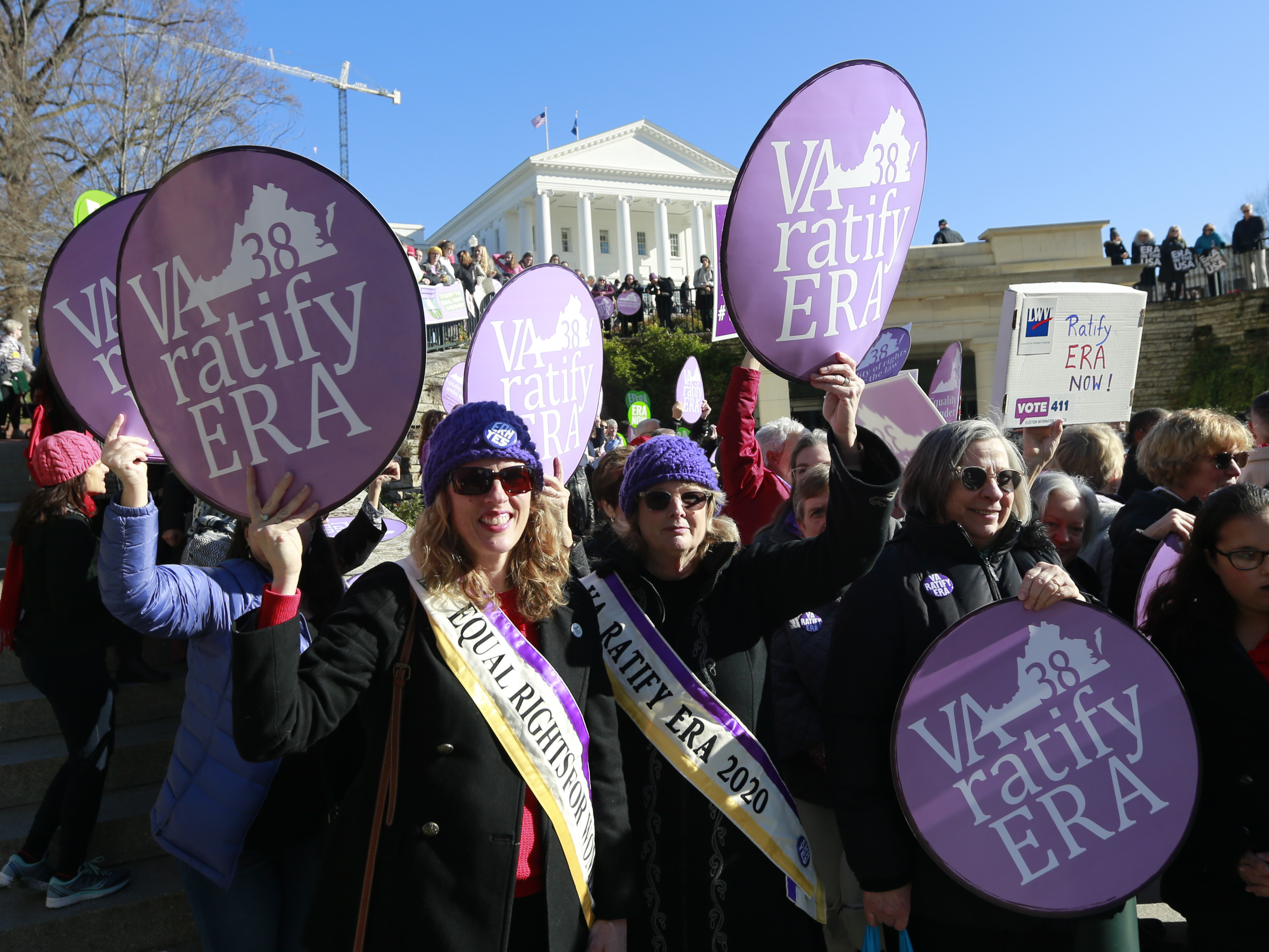 caption: Equal Rights Amendment supporters demonstrate outside Virginia State Capitol in Richmond on Jan. 8. The state is close to ratifying the ERA, even as the measure's future nationally remains in doubt.