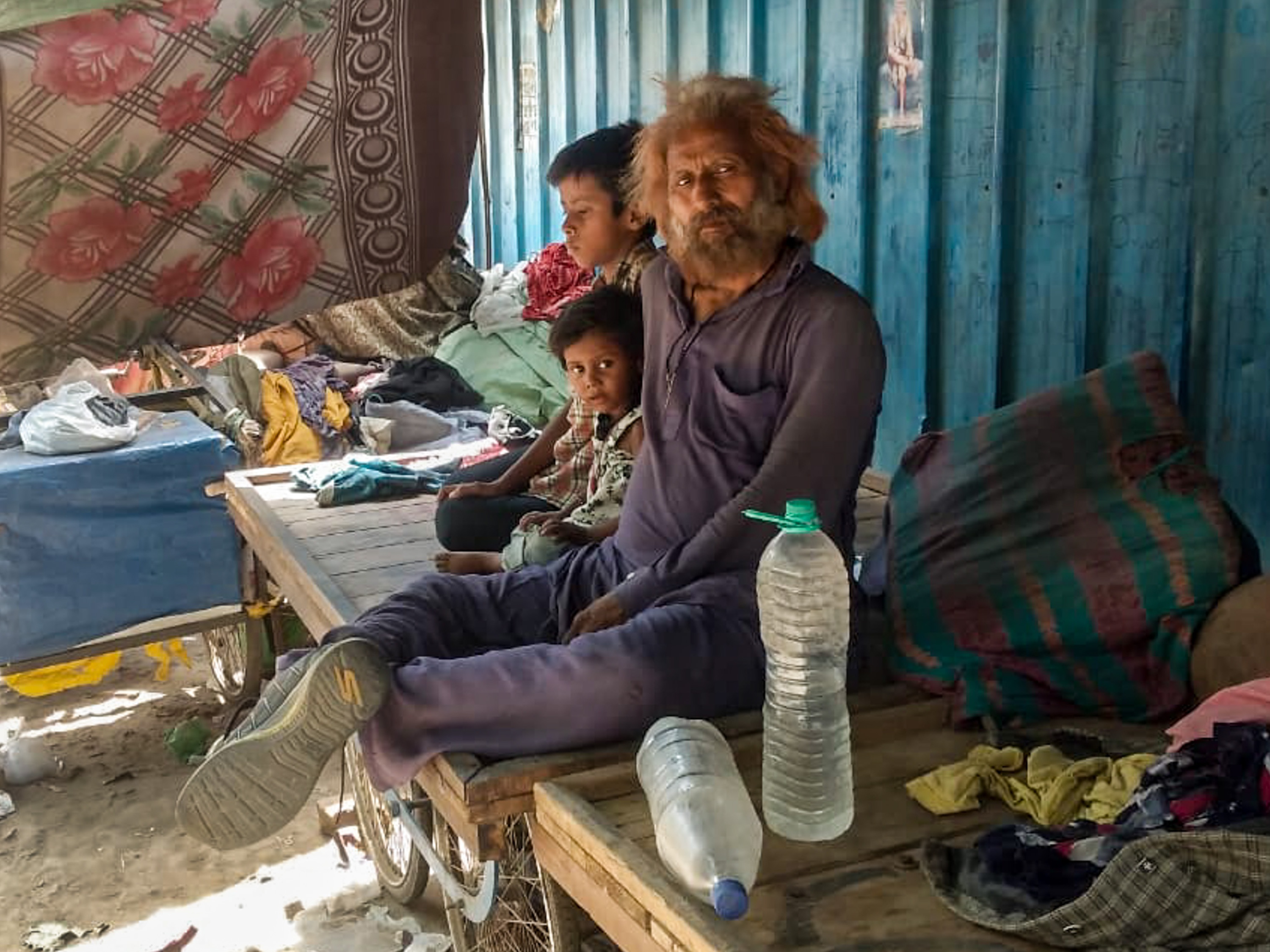 caption: Ansar Khan, 40, whose six-month-old daughter died on late May. He blames the extreme heat.<br>