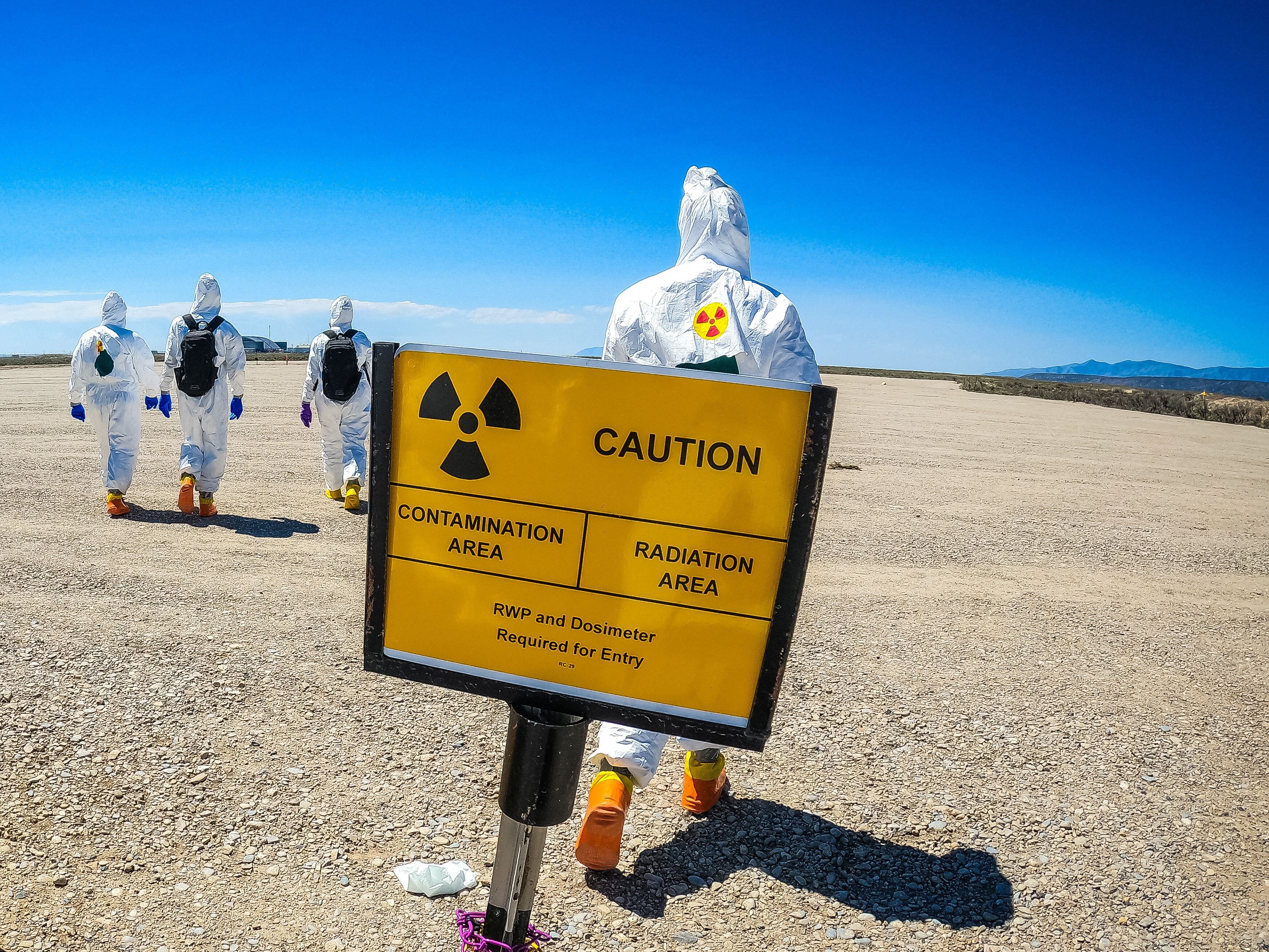 caption: Members of the Nuclear Emergency Response Team training for a radiological contamination scenario. For 50 years, the secretive team has been the first line of defense against nuclear emergencies.