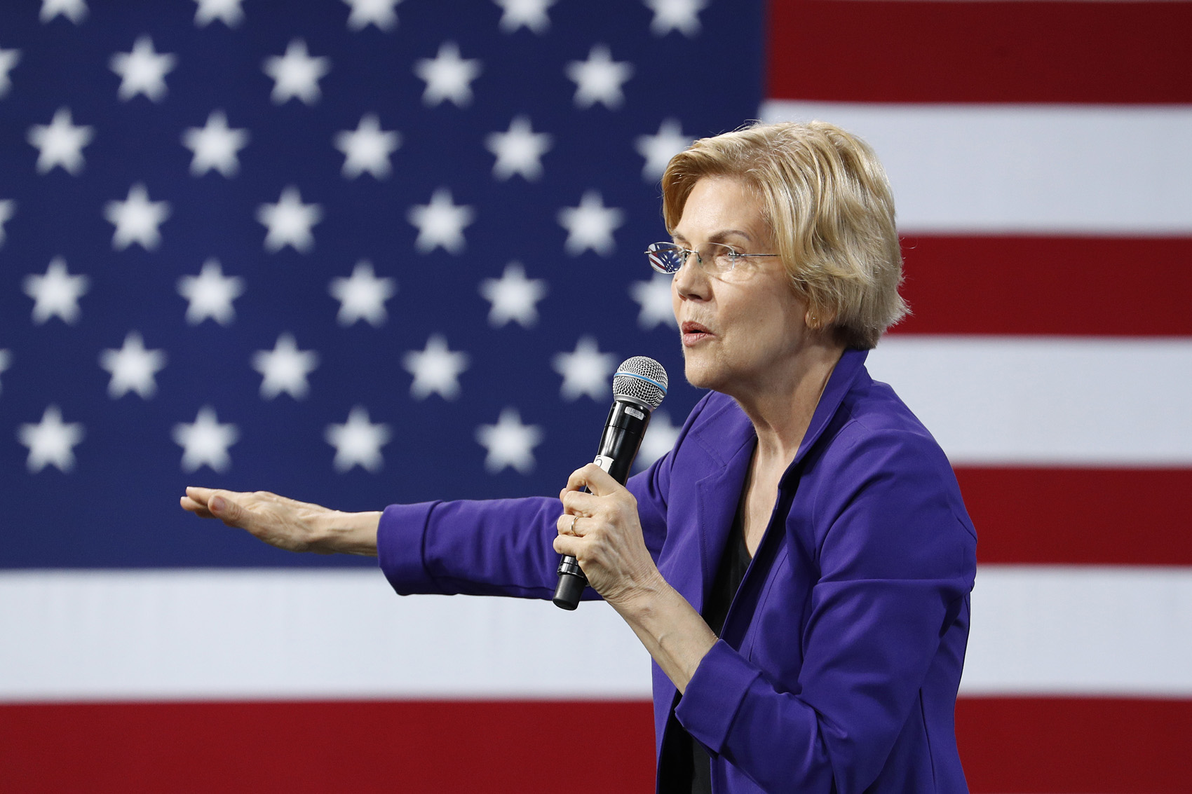 caption: Democratic presidential candidate Sen. Elizabeth Warren, D-Mass., speaks at a Service Employees International Union forum on labor issues, Saturday, April 27, 2019, in Las Vegas. (John Locher/AP)