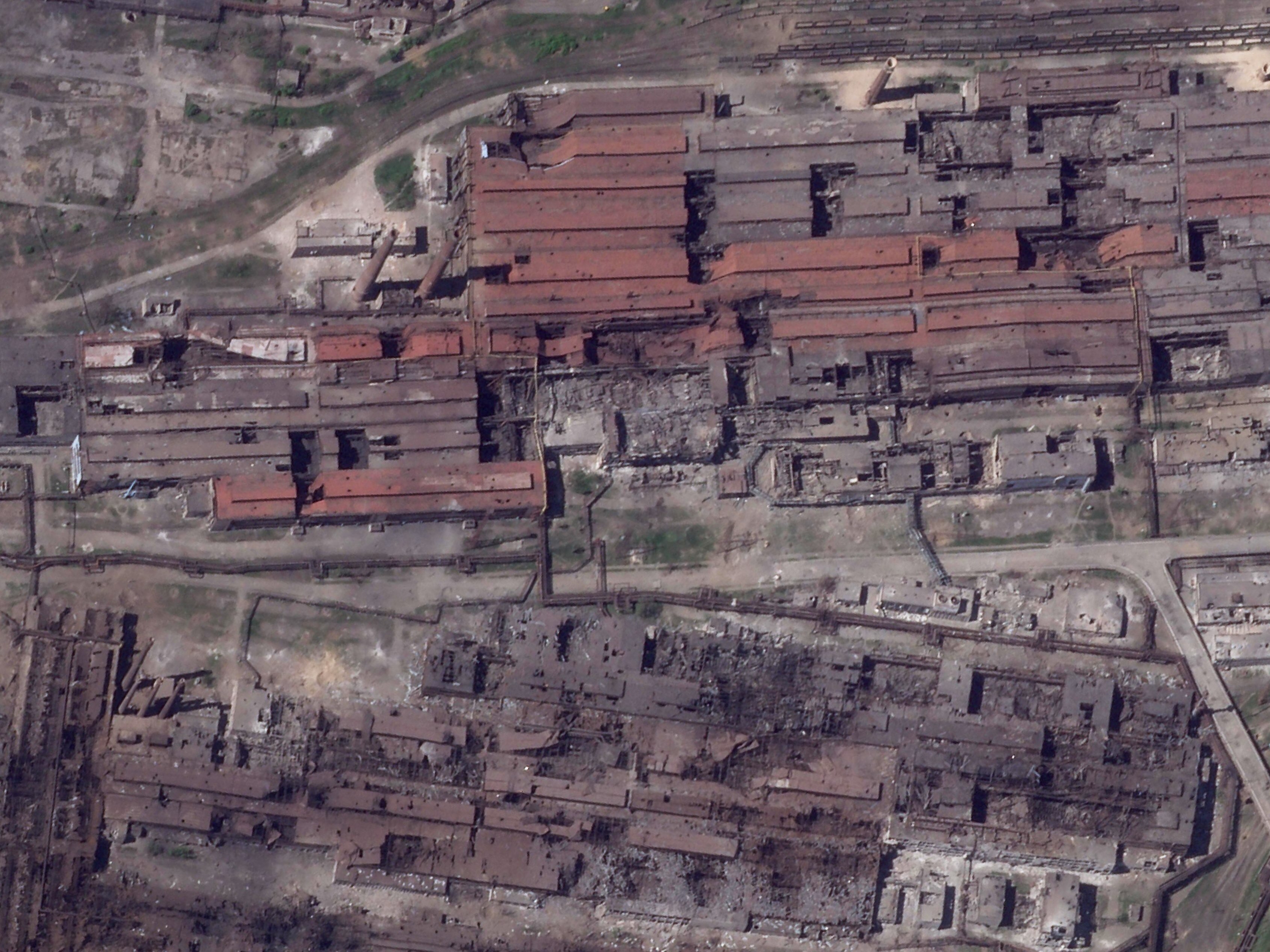 caption: This satellite image taken by Planet Labs PBC shows damage at the Azovstal steelworks in Mariupol, Ukraine, on Friday.
