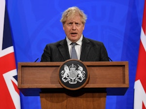 caption: Britain's Boris Johnson, pictured in 2021, resigned as prime minister last year, but his policies are still felt. He resigned his seat in the House of Commons last week after receiving a draft of a report excoriating his behavior as prime minister.