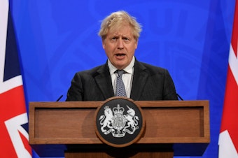 caption: Britain's Boris Johnson, pictured in 2021, resigned as prime minister last year, but his policies are still felt. He resigned his seat in the House of Commons last week after receiving a draft of a report excoriating his behavior as prime minister.