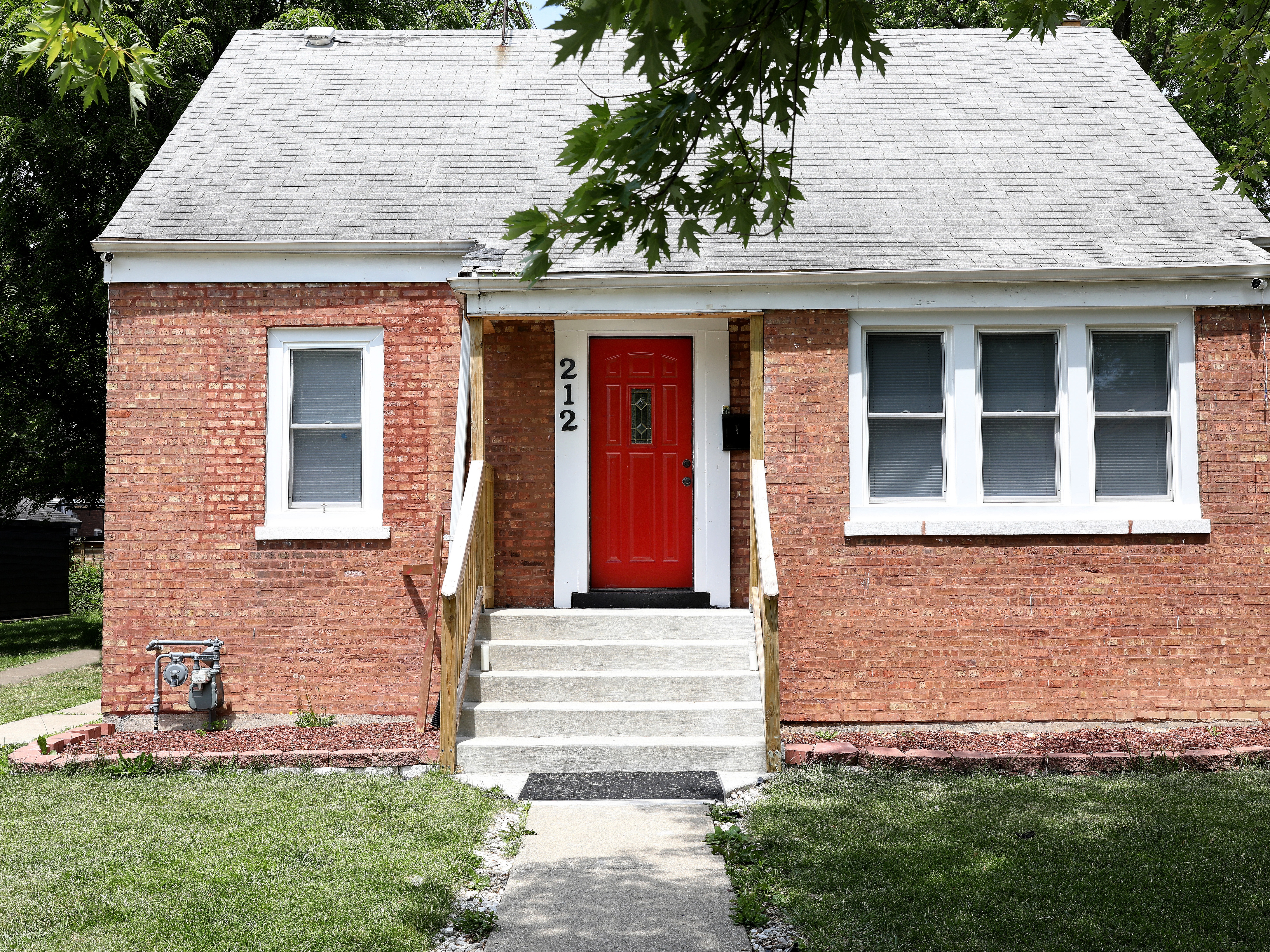 caption: Pope Leo's childhood home in Dolton, Ill., is up for auction later this month.