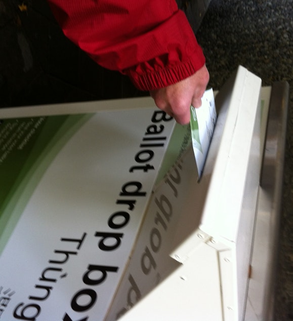 caption: A ballot drop box in Seattle.