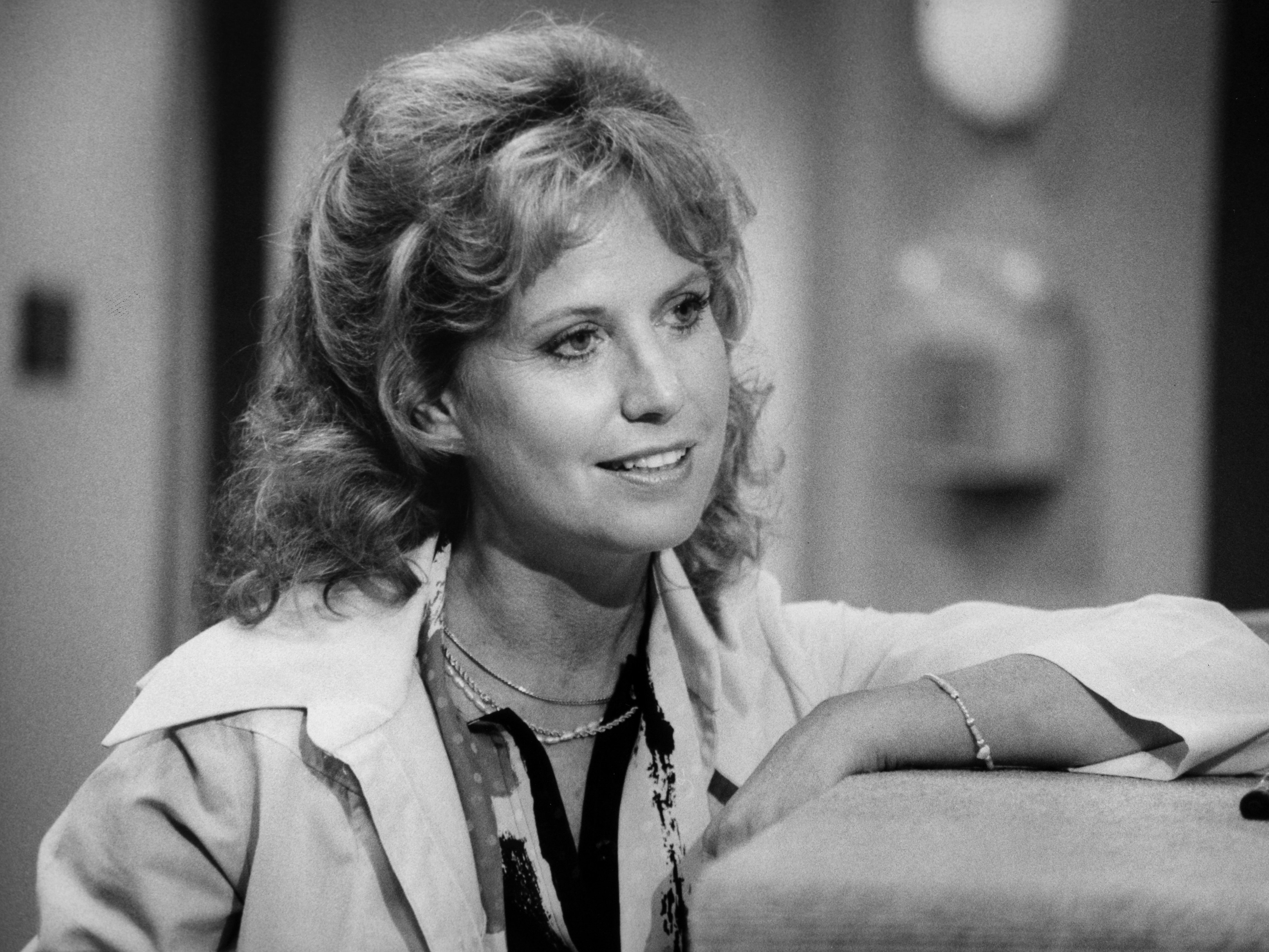 caption: Leslie Charlson played Dr. Monica Quartermaine on <em>General Hospital. </em>She's shown above in 1982.