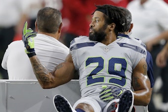 caption: - Seattle Seahawks defensive back Earl Thomas (29) gestures to his bench as he leaves the field after breaking his leg against the Arizona Cardinals during the second half of an NFL football game, Sunday, Sept. 30, 2018, in Glendale, Ariz.
