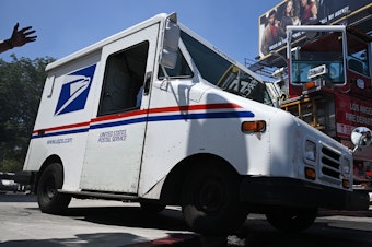 caption: The U.S Postal Service is planning to implement temporary price increases for the upcoming 2022 holiday season. The agency said it will help keep them competitive and cover increased costs for the season.