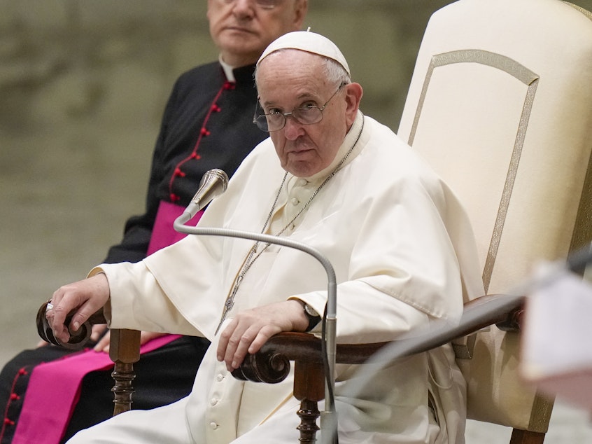 caption: Pope Francis listens to speeches during his weekly general audience in the Pope Paul VI hall at the Vatican, Wednesday, Oct. 6, 2021.