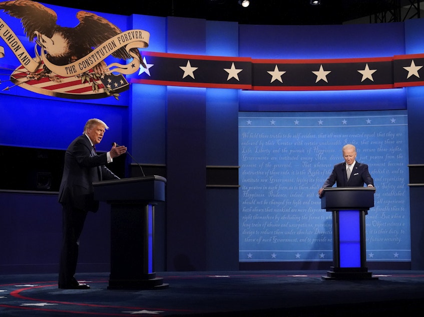 caption: President Trump and Democratic presidential nominee Joe Biden square off during the first presidential debate on Sept. 29.