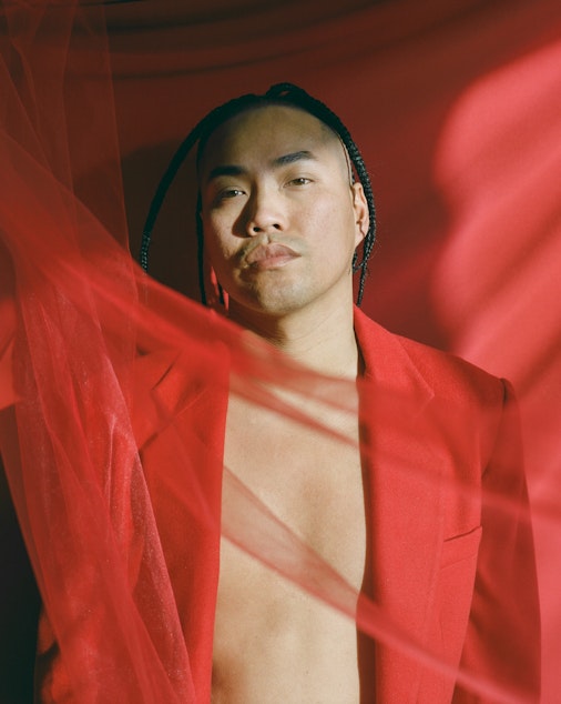 caption: Portrait of Chris from Brooklyn-based photographer Andrew Kung's series The All-American. Kung says this series aims to examine masculinity and what it means to be American within the context the stereotype of the desexualized Asian man. 